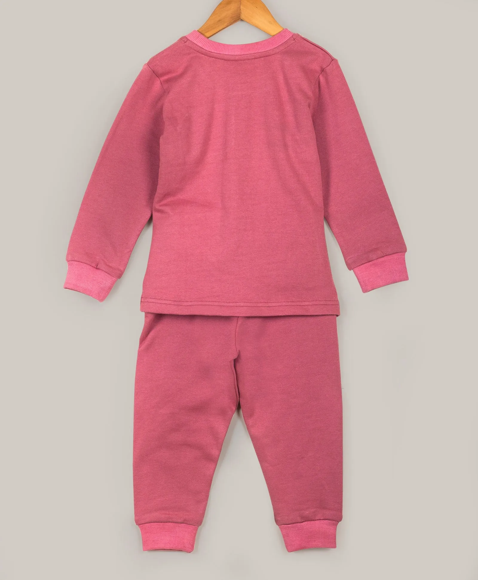 Pink tracksuit with bus embroidery patch